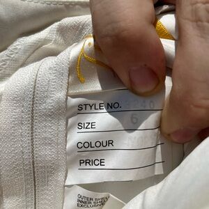 Flower girl dress size 6, worn once, cream color, very beautiful